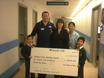 Present the Whittington with the donation cheque